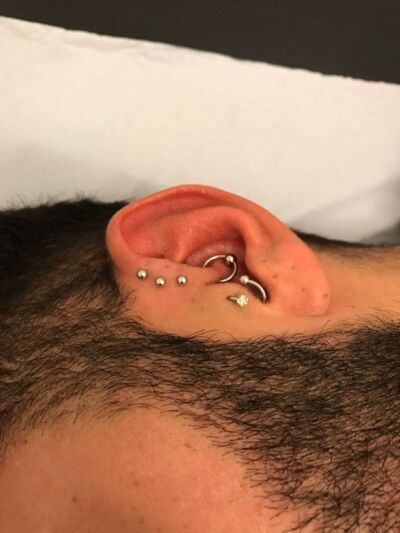 Surface Tragus Piercing by Underground Tattoos Watford
