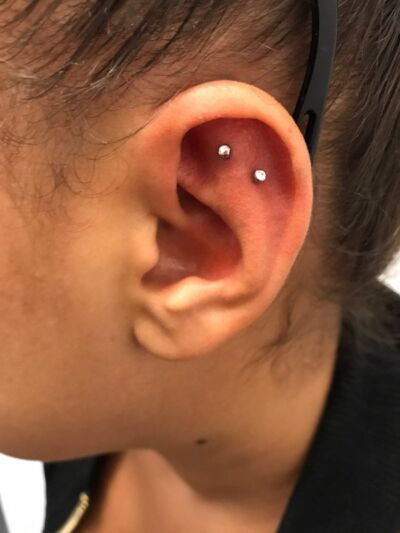 Double Flat Piercing by Underground Tattoos Watford
