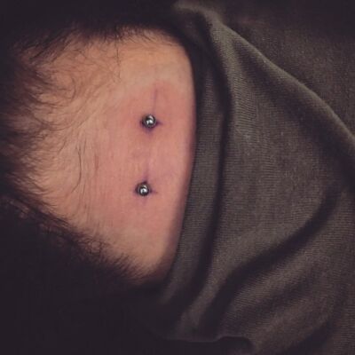 Neck Piercing by Underground Tattoos Watford